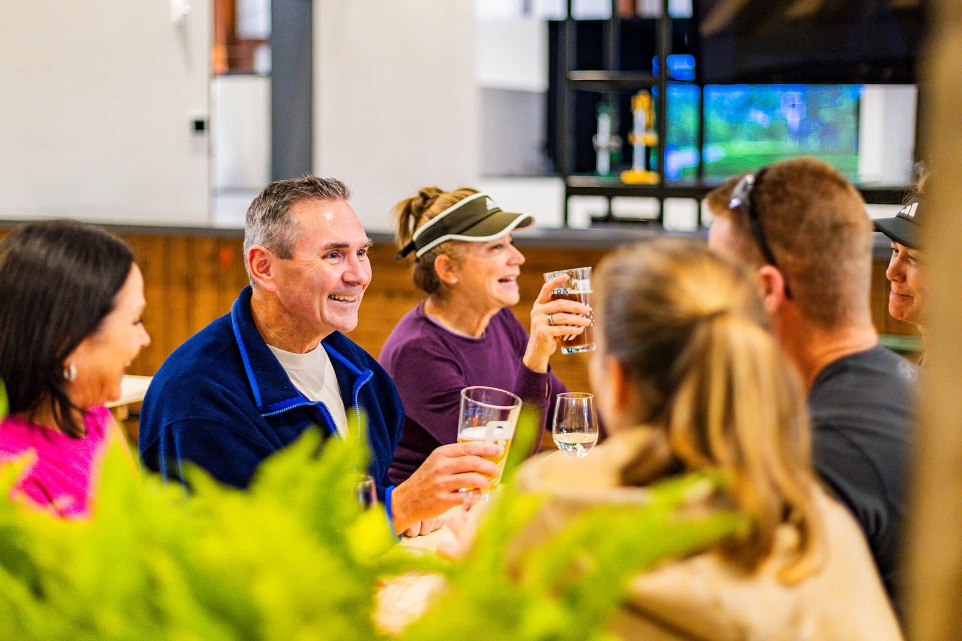 Friends enjoying drinks at Dilly's Oasis Bar