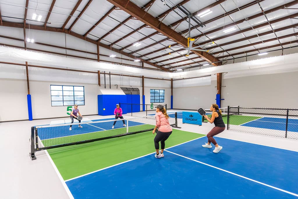 Indoor pickleball courts at The Pickle Yard